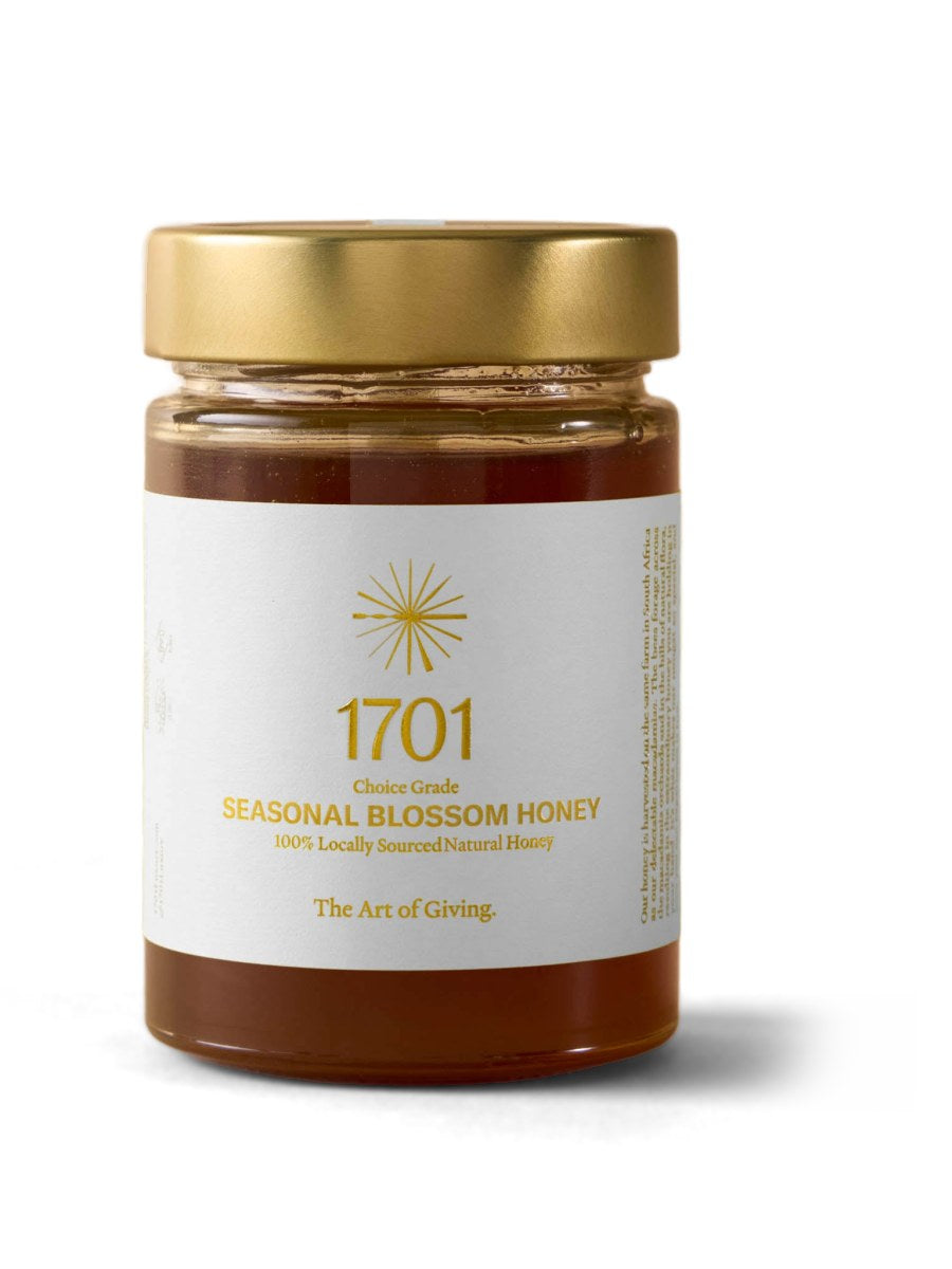 1701 Seasonal Blossom Honey, 100% locally sourced natural honey in a 380ml glass jar with gold lid