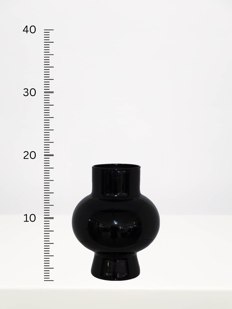 Black Saturn Vase - 18cm next to a centimetre ruler showing its height