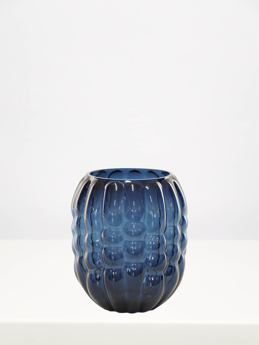 Blue Duro Vase - 20cm on a white table against a soft grey wall