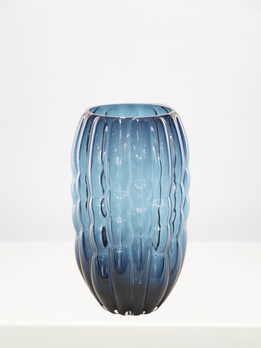 Blue Duro Vase - 29cm on a white table against a soft grey wall