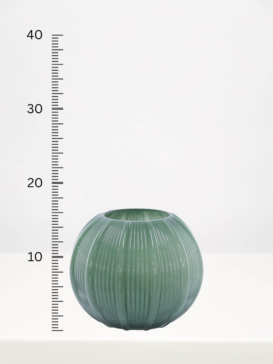 Fern Green Stripe Ball Vase - 16cm next to a centimetre ruler showing its height