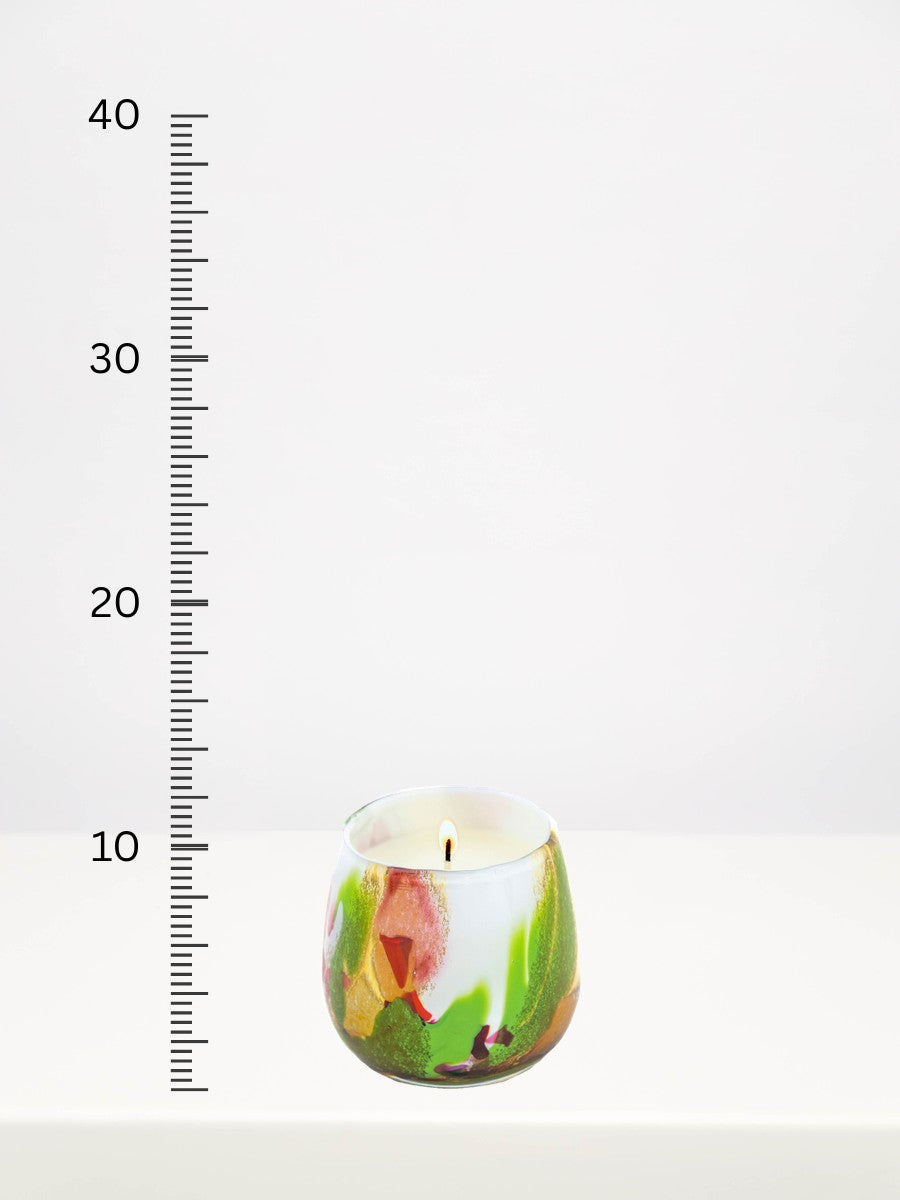 Fidrio - Mixed Colours Candle - Medium next to a centimetre ruler showing its height
