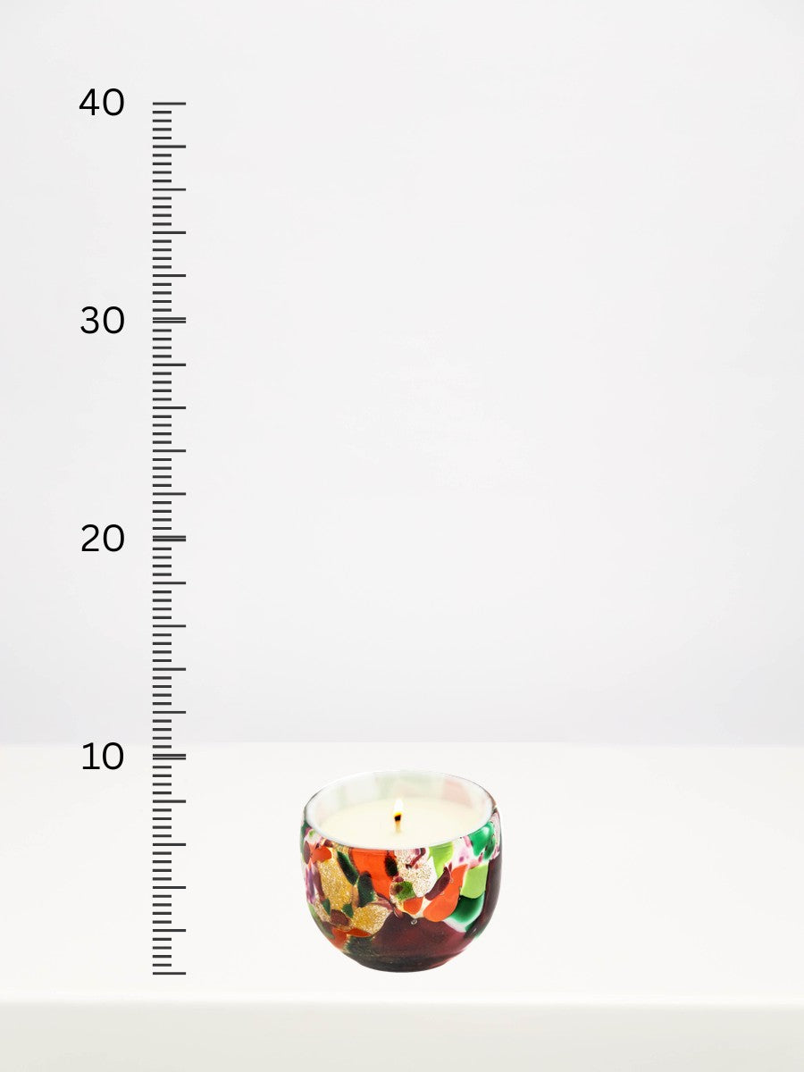 Fidrio - Mixed Colours Candle - Small next to a centimetre ruler showing its height