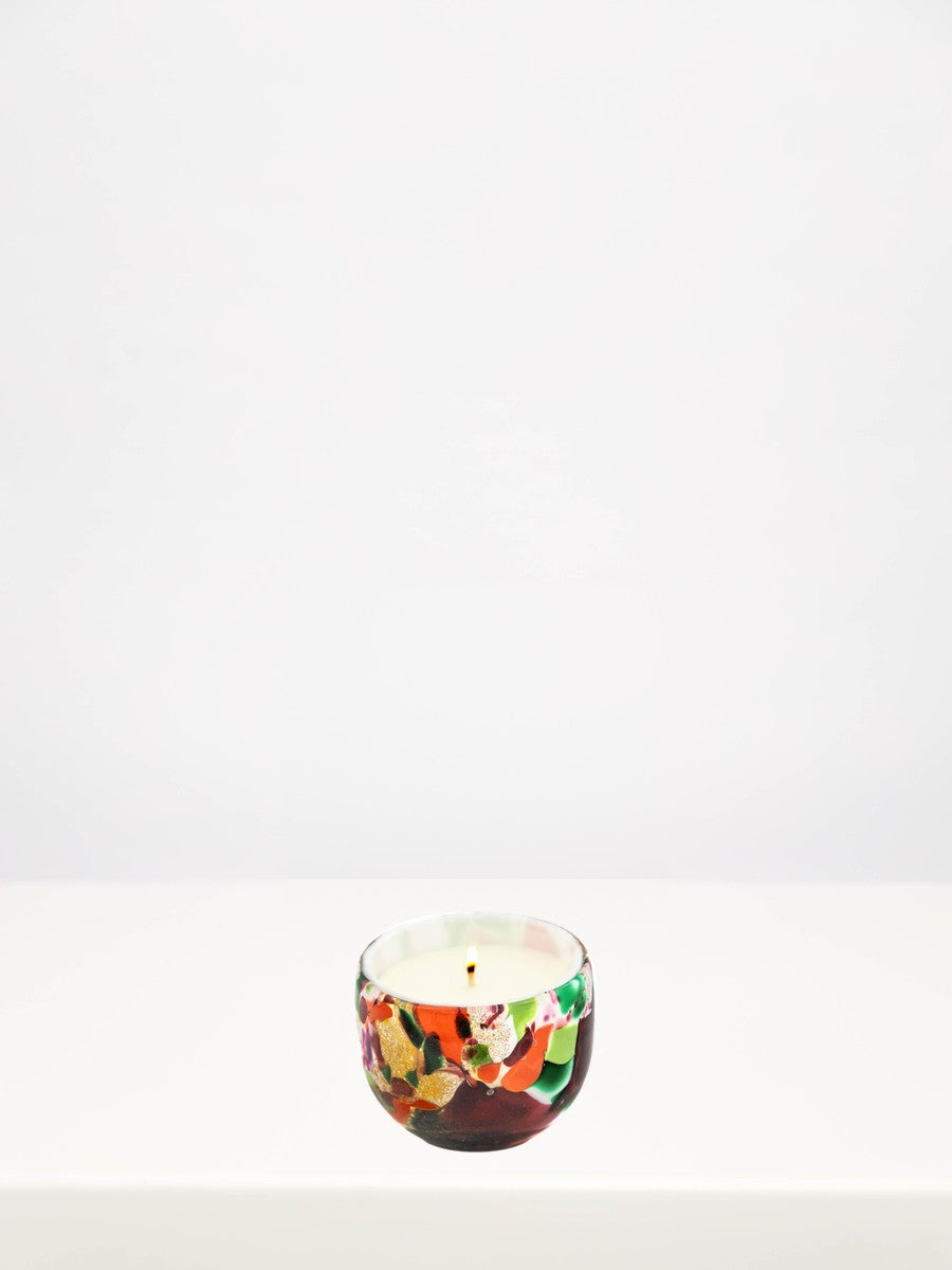Fidrio - Mixed Colours Candle - Small on a white table against a soft grey wall