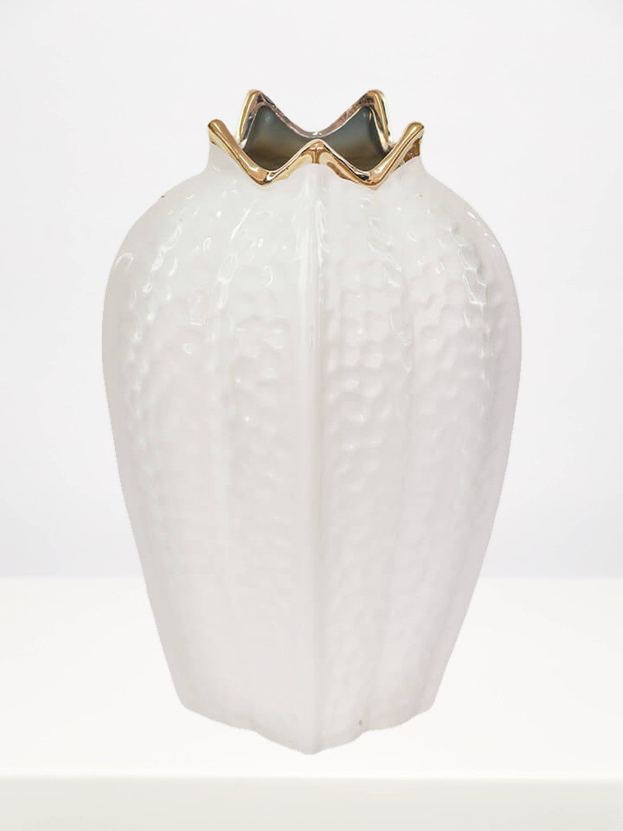 Gold & White Pomegranate Vase - 38cm on a white table against a soft grey wall