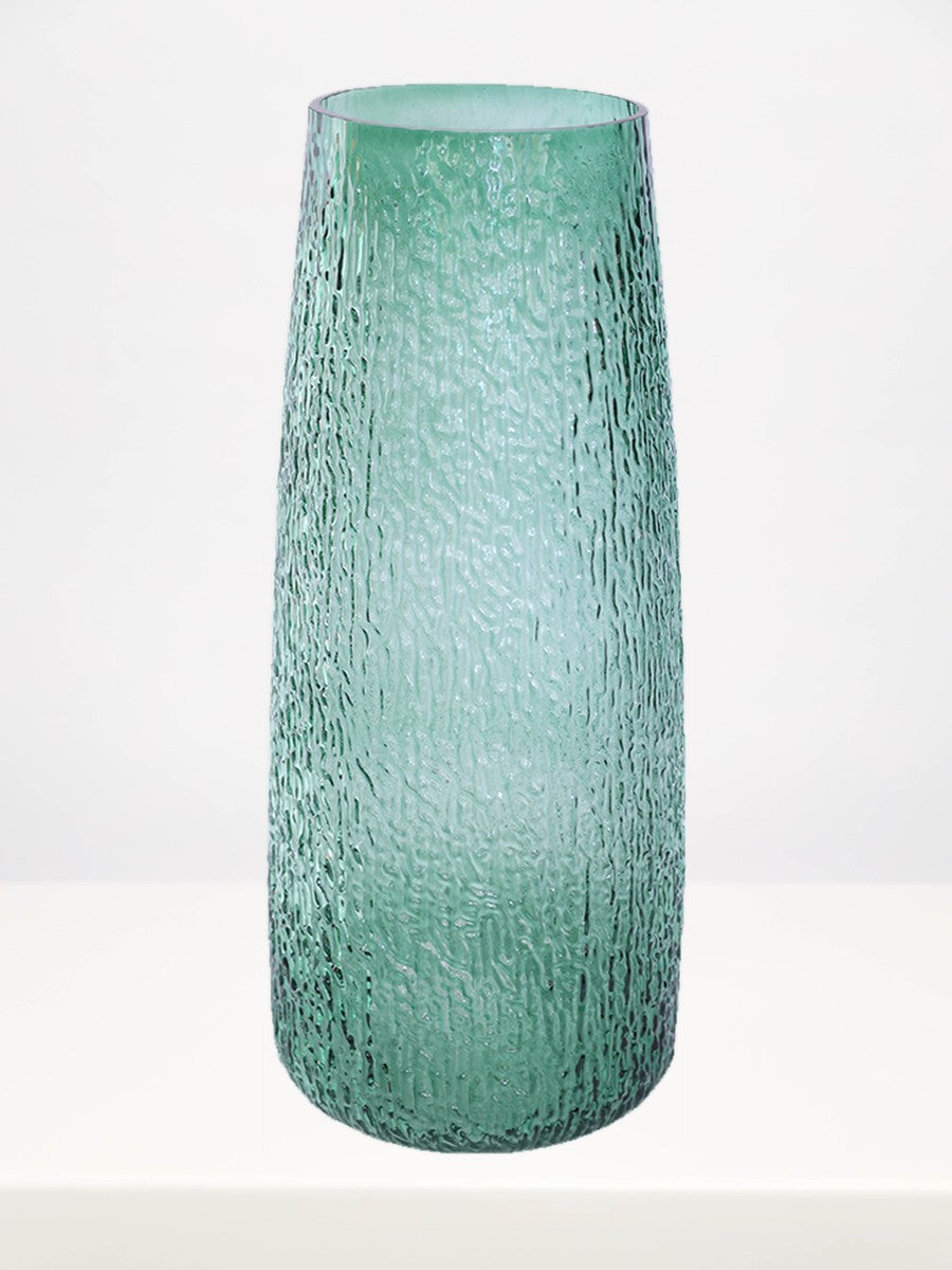 Green Rain Vase - 40cm on a white table against a soft grey wall