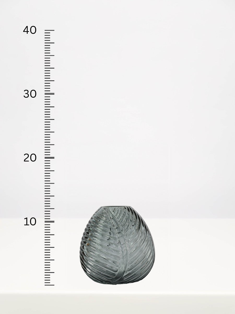 Grey Leaf Bud Vase - 12cm next to a centimetre ruler showing its height