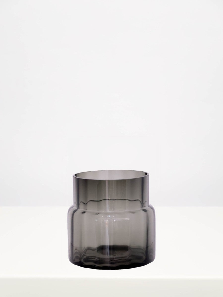 Grey Optic Line Vase - 16cm on a white table against a soft grey wall