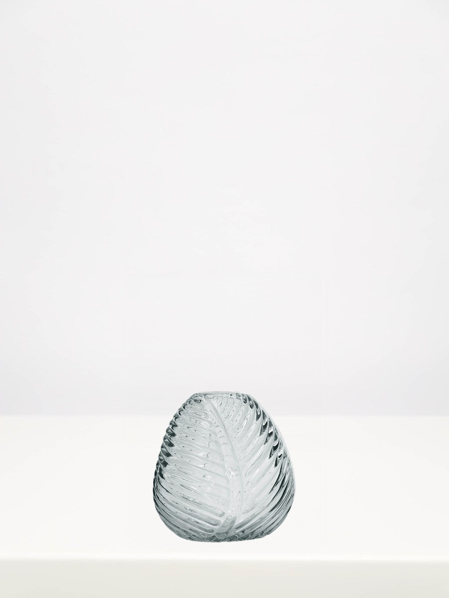 Leaf Bud Vase - 12cm on a white table against a soft grey wall