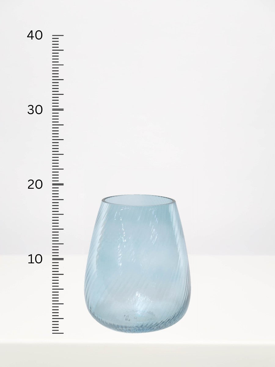 Soft Blue Ribbed Vase - 18cm next to a centimetre ruler showing its height