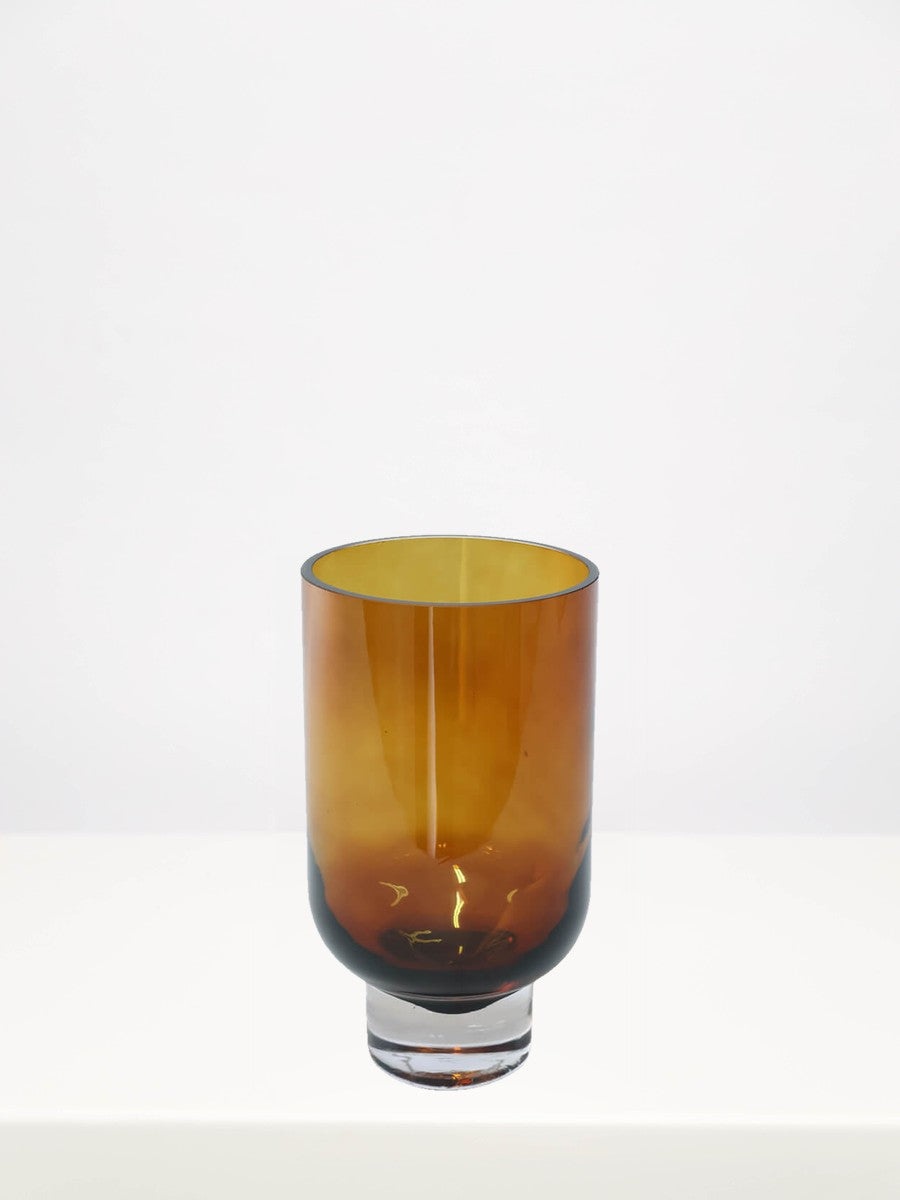 Soho Amber Vase - 22cm on a white table against a soft grey wall