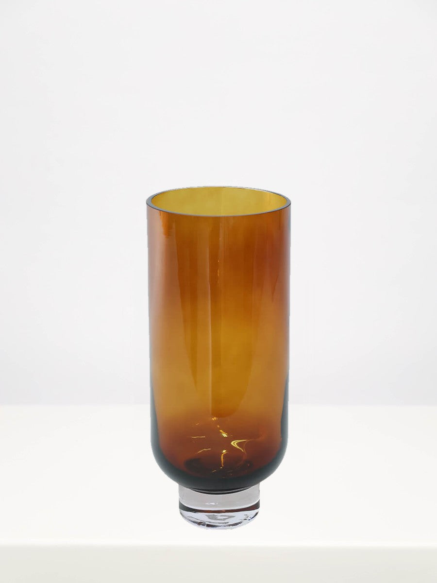 Soho Amber Vase - 28cm on a white table against a soft grey wall