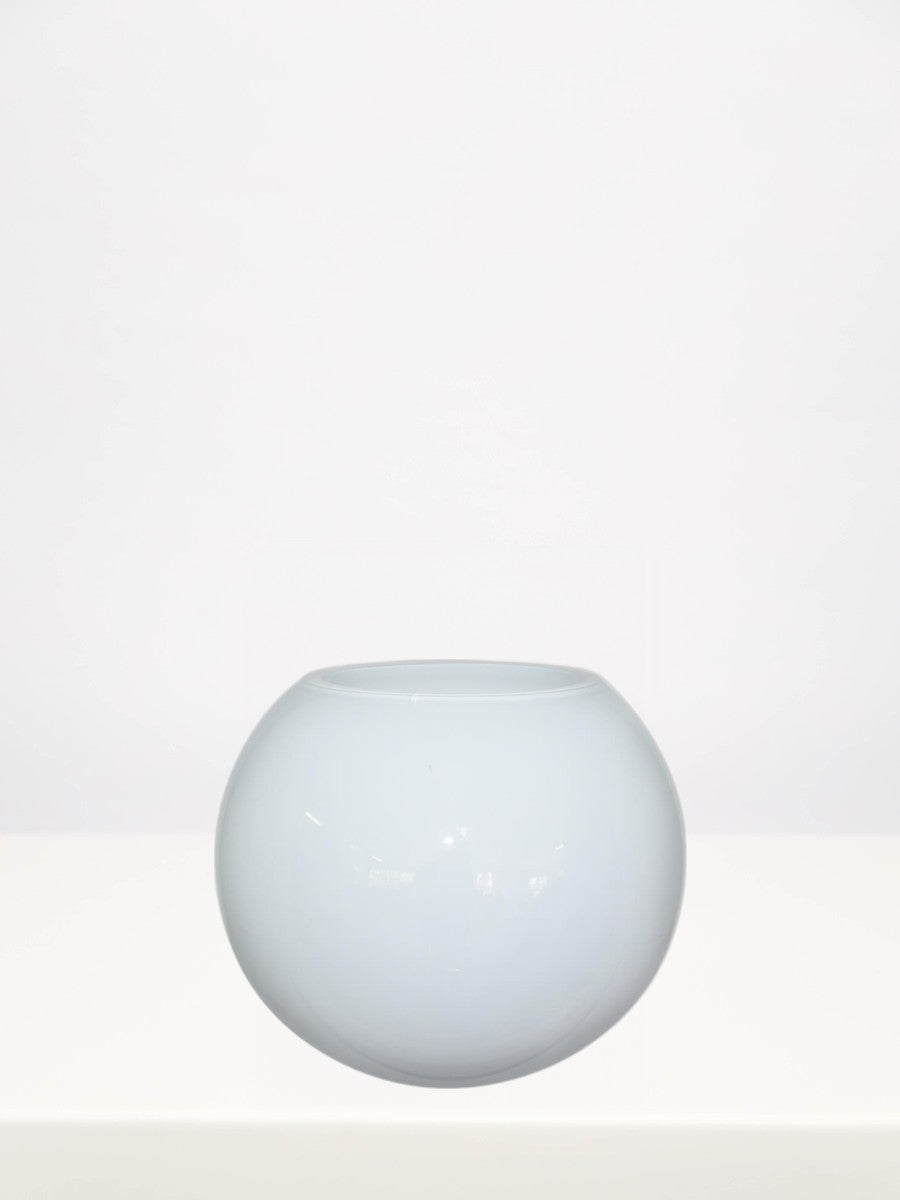 White Bubble Ball Vase - 17cm on a white table against a soft grey wall