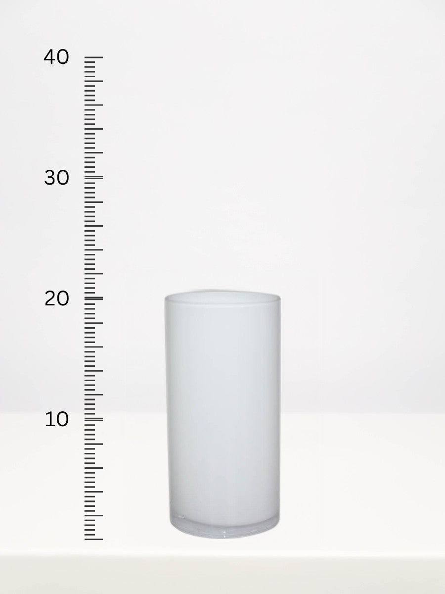 White Cylinder Vase - 20cm next to a centimetre ruler showing its height